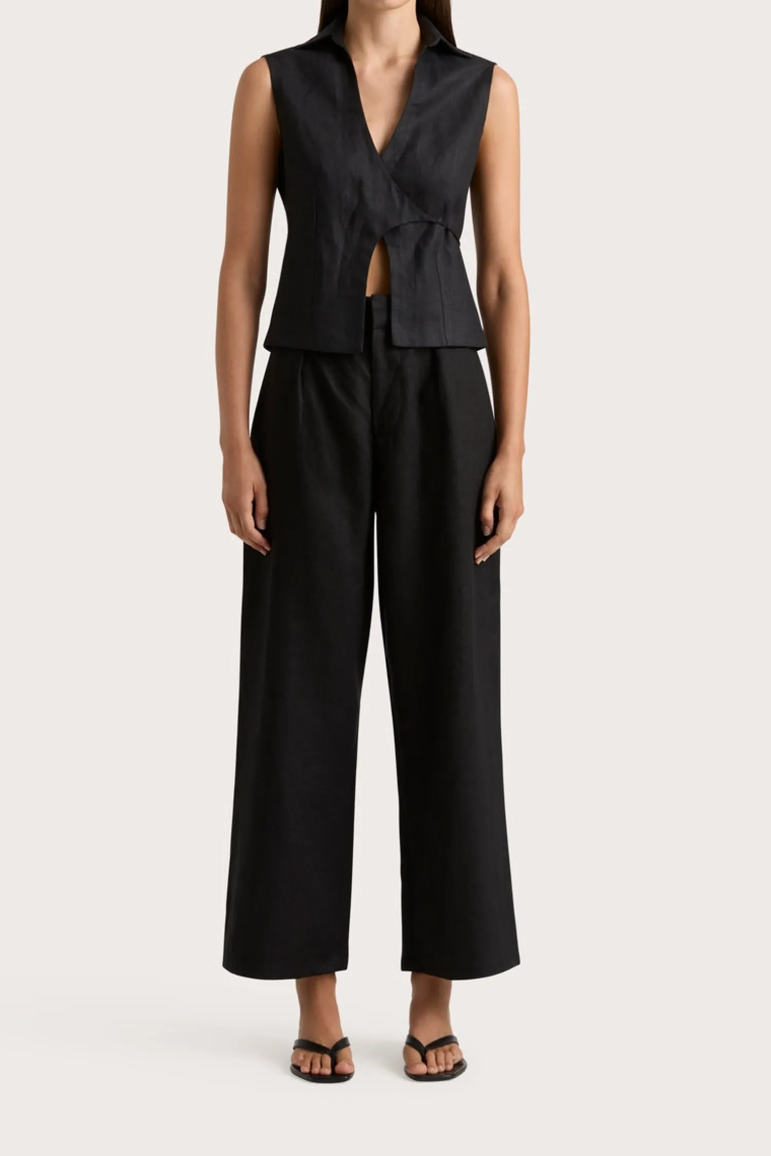 Shop FAITHFULL THE BRAND ANTIBES SLEEVELESS WRAP SHIRT Black