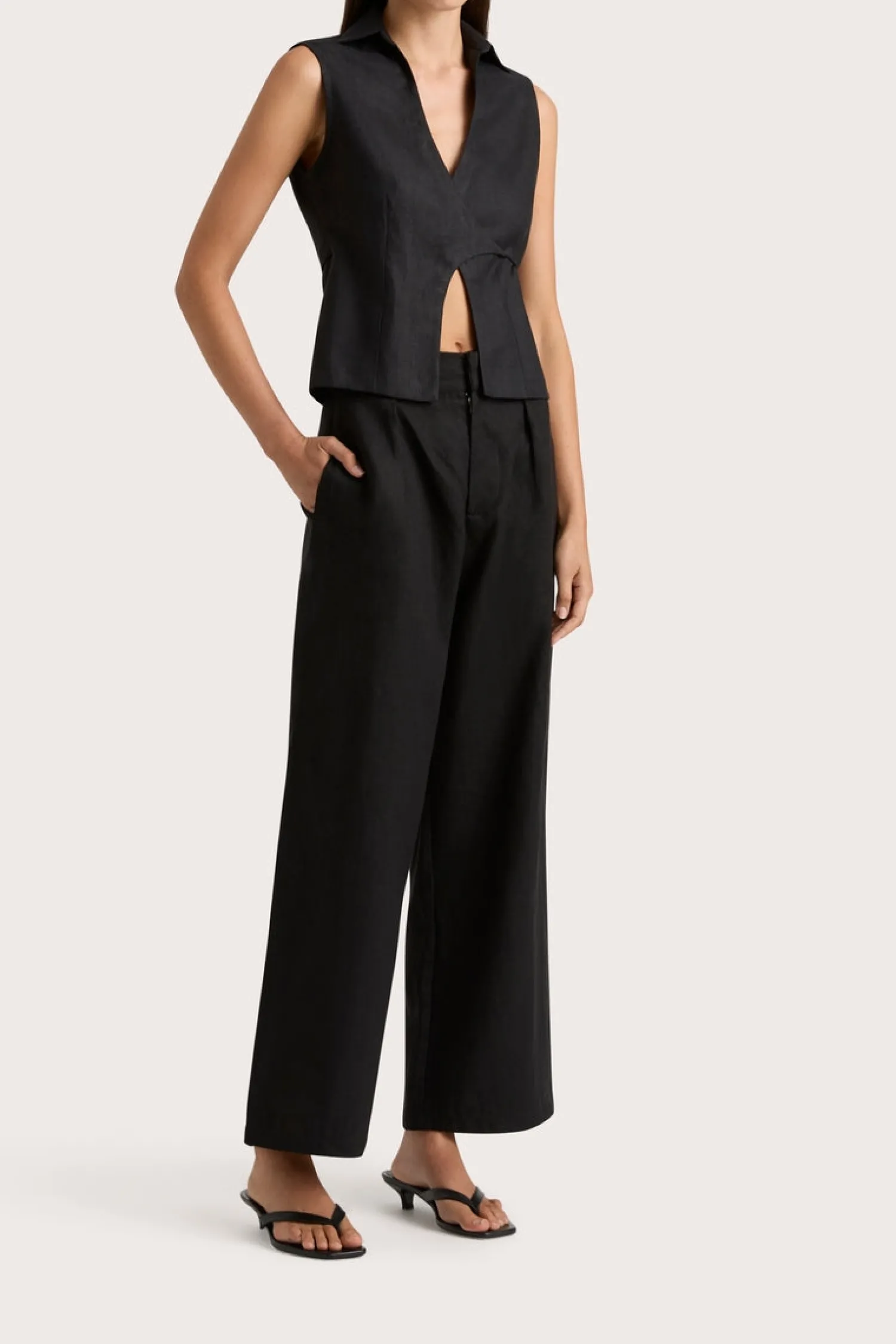 Shop FAITHFULL THE BRAND ANTIBES SLEEVELESS WRAP SHIRT Black