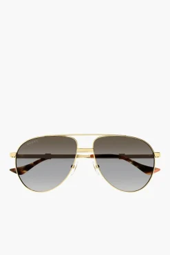 Shop GUCCI NAVIGATOR FRAME SUNGLASSES Gold